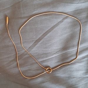 Brass choker with weighted pendant